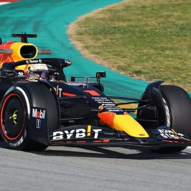 F1 car driving down a curve
